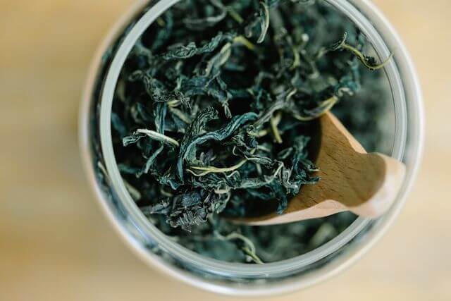 Loose green tea leaves